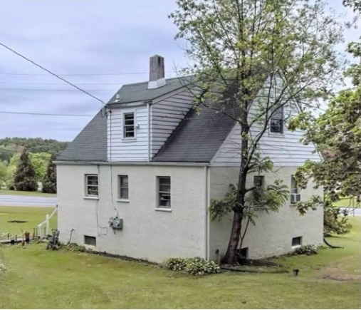 Original home exterior before the addition, side view